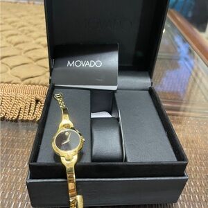 Movado Women's Gold and Black Watch